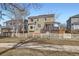 Beautiful home exterior with a fenced yard, patio, and well-maintained landscaping at 3080 Madison Ln, Broomfield, CO 80023
