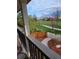 A picturesque porch view overlooking a lush green space with walking path at 3080 Madison Ln, Broomfield, CO 80023