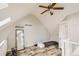 Attic bedroom with vaulted ceiling, wood flooring, and lots of natural light at 1430 18Th St # 16, Boulder, CO 80302