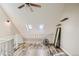 Bright attic bedroom featuring vaulted ceiling, wood flooring, and lots of light from skylights at 1430 18Th St # 16, Boulder, CO 80302