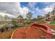Landscaped backyard with a gazebo, outdoor lounge space, and garden beds at 15785 W Second Ave, Golden, CO 80401