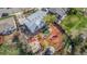 Aerial view of backyard featuring a patio, fire pit, garden, and lush greenery at 15785 W Second Ave, Golden, CO 80401