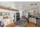 Bright kitchen with stainless steel appliances and a view into the next room through an opening in the wall at 15785 W Second Ave, Golden, CO 80401
