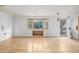Open living space with laminate flooring, bay window, and natural light, ready for customization at 15785 W Second Ave, Golden, CO 80401