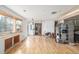 Inviting living room featuring laminate flooring, and natural light, offering a versatile space at 15785 W Second Ave, Golden, CO 80401