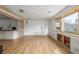 Bright and airy living room with laminate flooring and large windows at 15785 W Second Ave, Golden, CO 80401