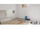 Room under construction featuring a small window and hardwood floors at 15785 W Second Ave, Golden, CO 80401