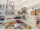 Well-organized walk-in pantry with ample shelving and storage solutions at 7756 S Eaton Park Ct, Aurora, CO 80016