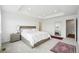 Bright bedroom with a bed, large windows, and an accent rug for added charm at 1884 Myron Ct, Erie, CO 80516