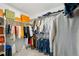 Walk-in closet with ample storage, shelving, and organization solutions at 1884 Myron Ct, Erie, CO 80516