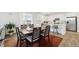 Dining area flows into the kitchen, providing ample natural light at 1884 Myron Ct, Erie, CO 80516