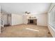 Living room with a fireplace and carpet flooring at 1275 Exquisite St, Castle Rock, CO 80109