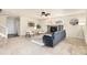 Spacious living room features a fireplace and lots of natural light at 1275 Exquisite St, Castle Rock, CO 80109