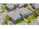 Stunning aerial view of modern townhomes with lush landscaping and accessible parking at 3751 W 136Th Ave # L1, Broomfield, CO 80023