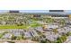 Aerial shot of townhomes near a grocery, a hospital, park and golf course at 3751 W 136Th Ave # L1, Broomfield, CO 80023