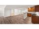 An open basement featuring hardwood floors, bar with sink, and built in cabinets at 3751 W 136Th Ave # L1, Broomfield, CO 80023