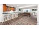 A spacious basement featuring a pool table, wet bar and multiple TVs, perfect for entertaining at 3751 W 136Th Ave # L1, Broomfield, CO 80023
