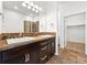 Well-appointed bathroom with dual sinks, a tiled shower, and ample storage at 3751 W 136Th Ave # L1, Broomfield, CO 80023