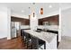 Modern kitchen featuring stainless steel appliances, a marble island, and sleek cabinetry at 3751 W 136Th Ave # L1, Broomfield, CO 80023