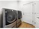 Featuring modern, front-loading washer and dryer units in a dedicated laundry room at 3751 W 136Th Ave # L1, Broomfield, CO 80023