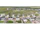 Aerial view of the community showcasing new homes with well-kept lawns in a desirable neighborhood at 42853 Ivydel St, Elizabeth, CO 80107