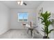 Bedroom featuring a desk, plant, window, and decor at 42853 Ivydel St, Elizabeth, CO 80107