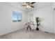 Bedroom featuring a window, desk, and decor at 42853 Ivydel St, Elizabeth, CO 80107