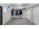 Spacious walk-in closet with ample hanging space, shelving, and a bright window at 42853 Ivydel St, Elizabeth, CO 80107