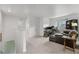 Upstairs loft space with a seating area, desk and view of the neighborhood at 42853 Ivydel St, Elizabeth, CO 80107