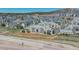 A wide aerial view of a community nestled near hills and mountains at 6017 Castlegate Dr # F15, Castle Rock, CO 80108