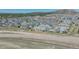 Stunning aerial view showcases the community's layout, landscaping, and proximity to surrounding natural beauty at 6017 Castlegate Dr # F15, Castle Rock, CO 80108