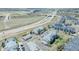 Expansive aerial view of the neighborhood highlights community living and nearby highway access at 6017 Castlegate Dr # F15, Castle Rock, CO 80108