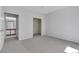 An empty bedroom with closet and entrance to a bathroom is ready for you at 6017 Castlegate Dr # F15, Castle Rock, CO 80108