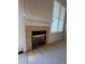 Close up of living room fireplace at 6017 Castlegate Dr # F15, Castle Rock, CO 80108