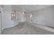 Bright and airy living room with kitchen access and a ceiling fan at 6017 Castlegate Dr # F15, Castle Rock, CO 80108