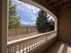 Covered porch with scenic views of mountains and trees in the distance at 6017 Castlegate Dr # F15, Castle Rock, CO 80108