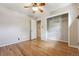 Bedroom features hardwood floors, a closet, and a ceiling fan at 2901 Lorraine Ct, Boulder, CO 80304