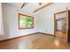 Bedroom features hardwood floors and beautiful wood trim around the windows at 2901 Lorraine Ct, Boulder, CO 80304