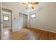 Bedroom features hardwood floors, a closet with shelving, and a ceiling fan at 2901 Lorraine Ct, Boulder, CO 80304