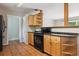 Kitchen with wood cabinets, black countertops, and stainless steel sink at 2901 Lorraine Ct, Boulder, CO 80304