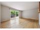 Bright living room with hardwood floors and sliding glass doors to outdoor patio at 2901 Lorraine Ct, Boulder, CO 80304