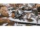 Aerial view of property, showing its setting amongst other homes and a waterway at 7177 W 8Th Ave, Lakewood, CO 80214