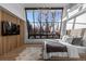 Modern bedroom with large windows and hardwood floors at 7177 W 8Th Ave, Lakewood, CO 80214