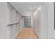 Large walk-in closet with ample shelving and hanging space at 7177 W 8Th Ave, Lakewood, CO 80214