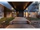 Modern front door entrance with brick and stone accents at 7177 W 8Th Ave, Lakewood, CO 80214