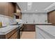 Modern kitchen with marble countertops and sleek cabinetry at 7177 W 8Th Ave, Lakewood, CO 80214