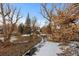 Peaceful stream flows through the property's backyard at 7177 W 8Th Ave, Lakewood, CO 80214