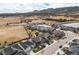 Panoramic aerial view of a neighborhood surrounded by scenic landscapes and mountain vistas at 2371 Pelican Bay Dr, Monument, CO 80132