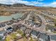 Breathtaking aerial shot showcasing the picturesque community and scenic lake at 2371 Pelican Bay Dr, Monument, CO 80132