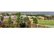 View of backyard featuring the fence and lush trees at 2371 Pelican Bay Dr, Monument, CO 80132